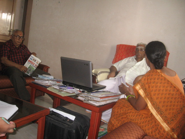Mr. V Sundaram (Left) & Mrs. Uma (Right) explaining about HJS to Mr. Vedantham of VHP